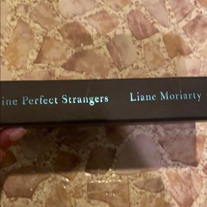 None perfect strangers by Liane Moriarty